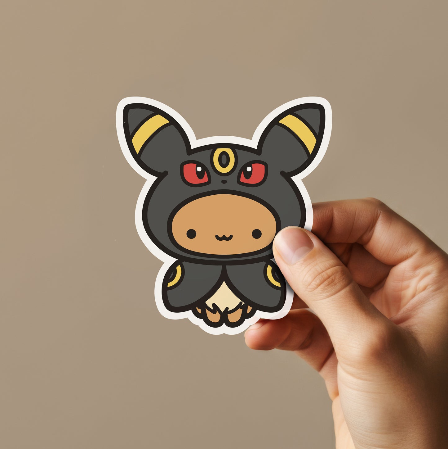 Cute Brown Animal Wearing Dark Poncho Sticker